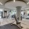 fitness center surrounded by floor-to-ceiling windows