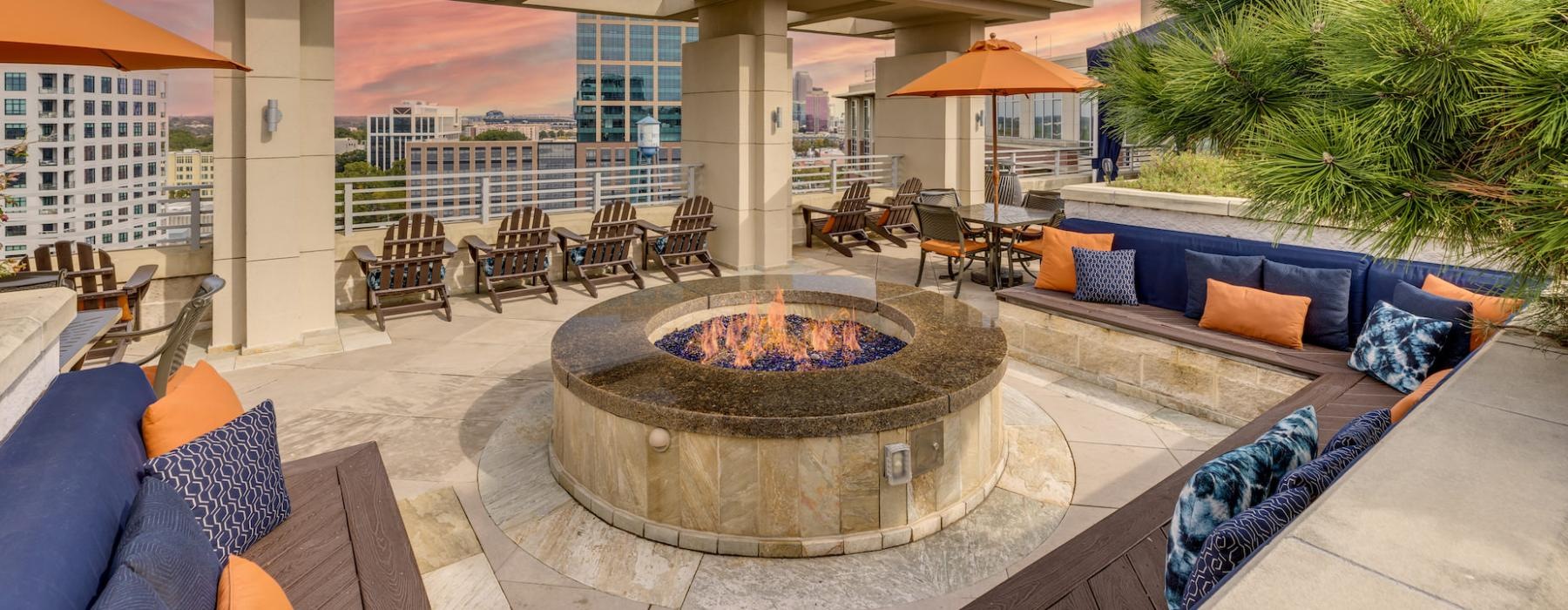 outdoor fire pit surrounded by bench seating