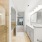 walk-in shower and separate tub in bathroom