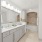 bright bathroom with shower/tub combo