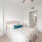 spacious bedroom with carpeting