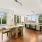 open concept dining area with track lighting