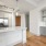 wine fridge and wet bar next o kitchen