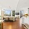 sun light floods open concept interiors with large windows
