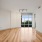 spacious living room with floor-to-ceiling windows