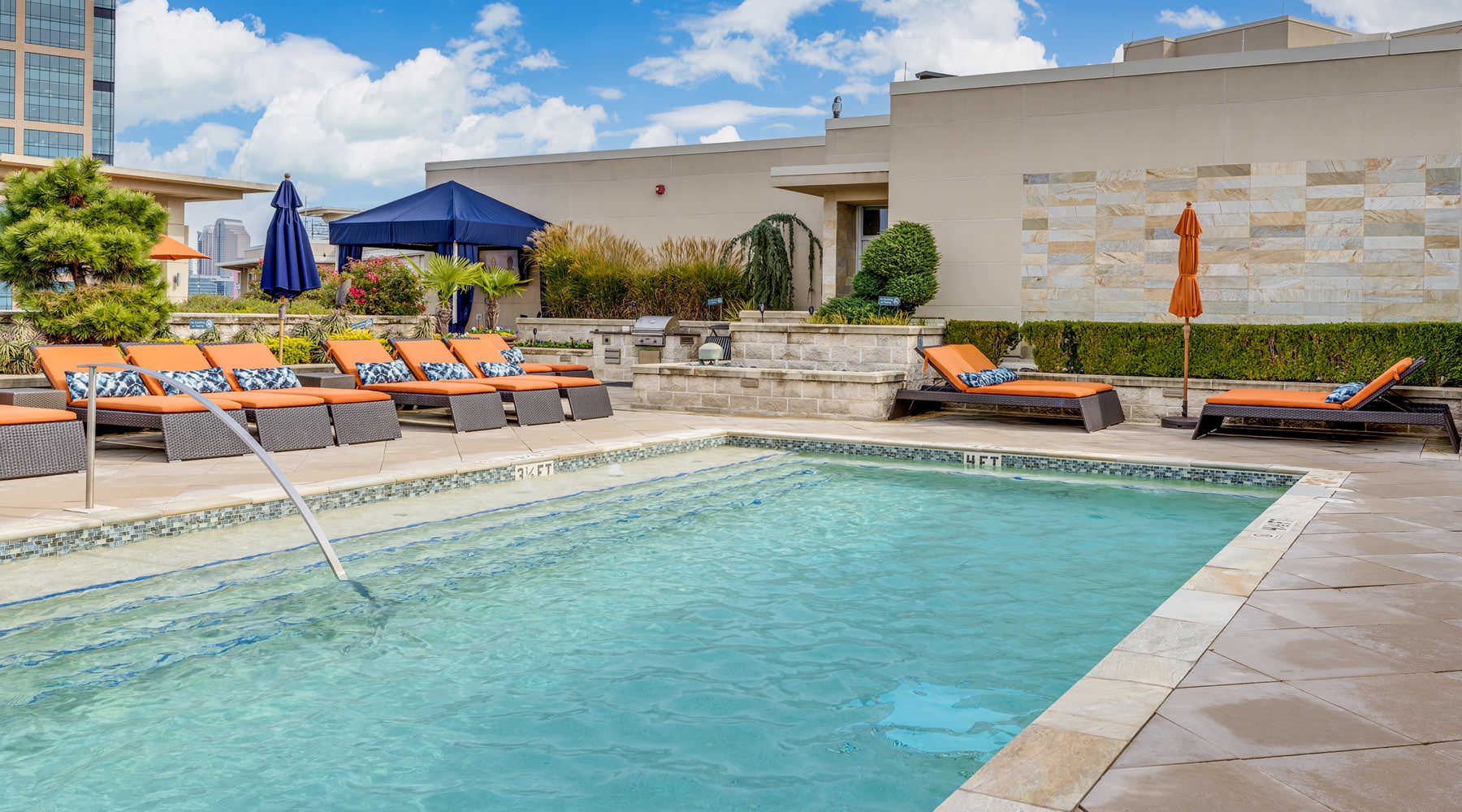 pool with outdoor amenities